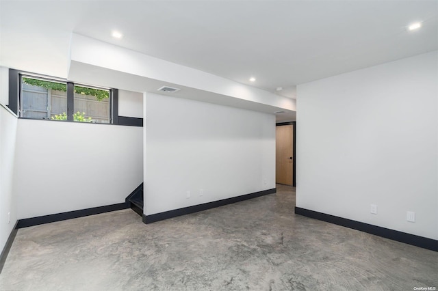 216 N St, Greenport, NY 11944 - spare room with concrete flooring and recessed lighting