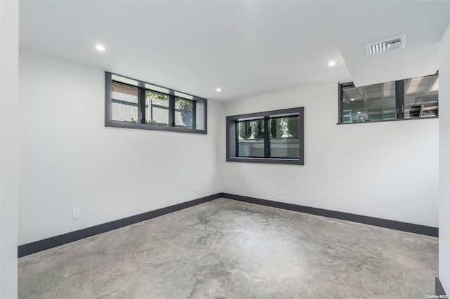 216 N St, Greenport, NY 11944 - empty room featuring concrete floors and recessed lighting