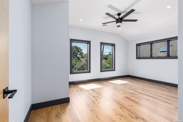 216 N St, Greenport, NY 11944 - spare room featuring wood finished floors, vaulted ceiling, recessed lighting, and a ceiling fan