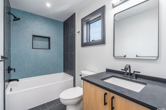 216 N St, Greenport, NY 11944 - bathroom featuring tile patterned floors, vanity, and shower / tub combination
