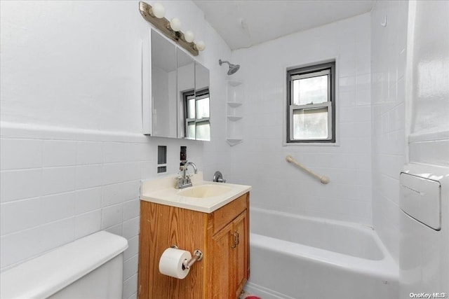 full bathroom with shower / bathtub combination, toilet, tile walls, and a wealth of natural light