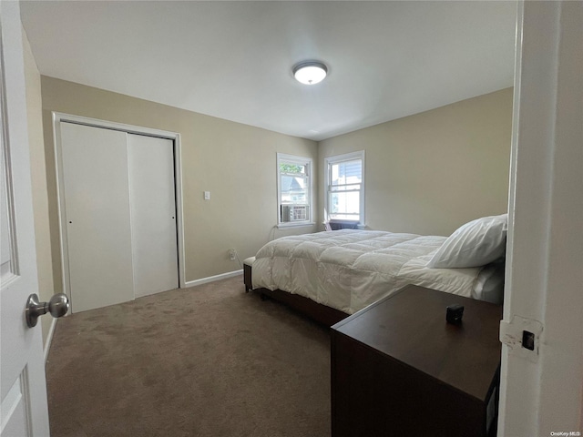 bedroom featuring dark colored carpet