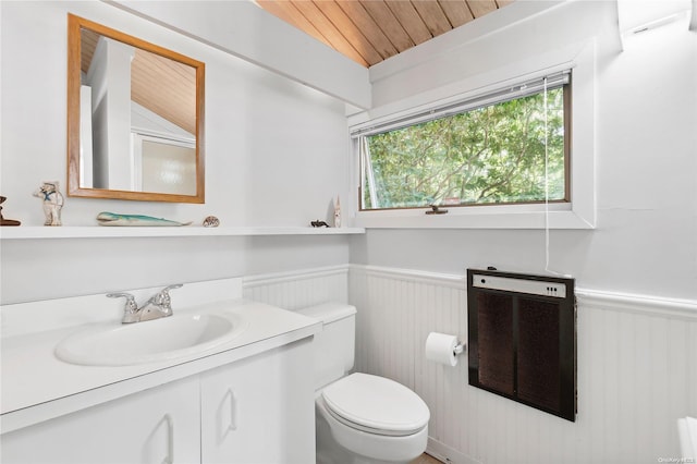 bathroom with vanity, lofted ceiling, wooden ceiling, toilet, and heating unit