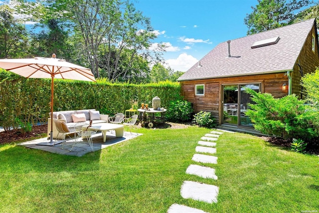 view of yard with a patio area and an outdoor hangout area