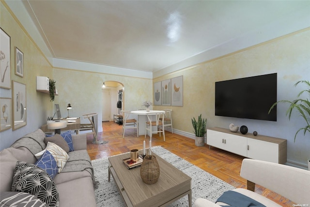 living room with parquet floors and crown molding