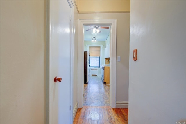 hallway featuring light hardwood / wood-style flooring