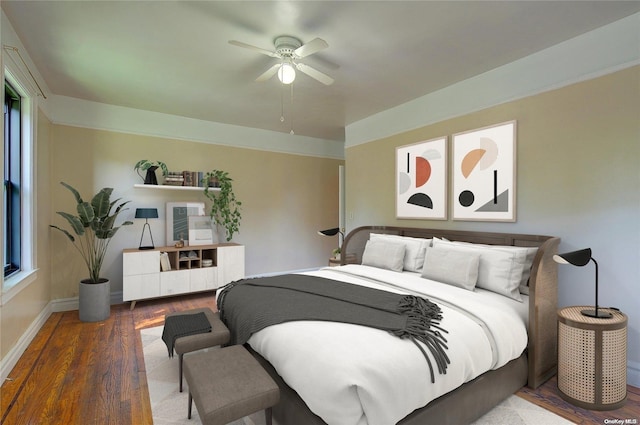 bedroom featuring ceiling fan and hardwood / wood-style floors