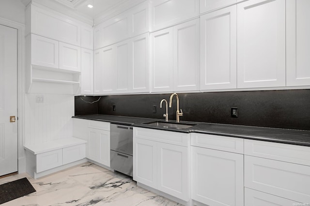 kitchen with dishwasher, white cabinetry, and sink