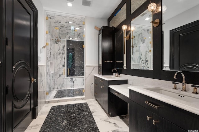 bathroom featuring vanity, an enclosed shower, and tile walls