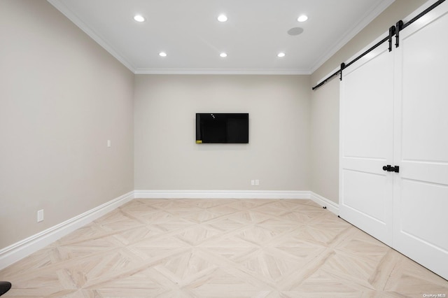 basement featuring a barn door, light parquet floors, and crown molding