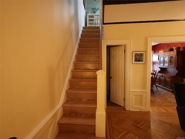 stairs with parquet flooring