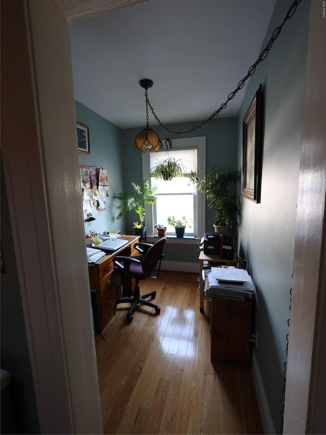 office area with light wood-type flooring