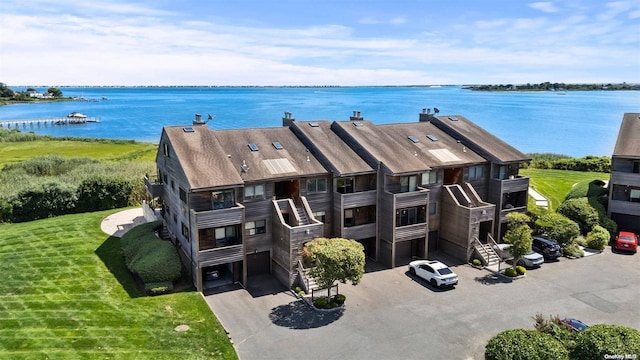 drone / aerial view with a water view