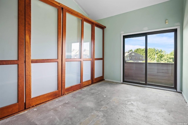 unfurnished sunroom with vaulted ceiling