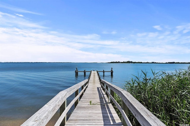 view of dock with a water view