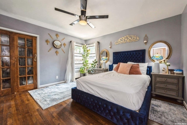 bedroom featuring ceiling fan and dark wood-type flooring