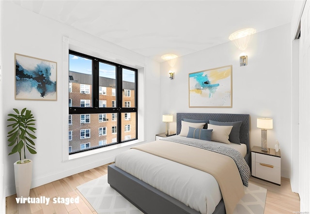 bedroom featuring light hardwood / wood-style flooring