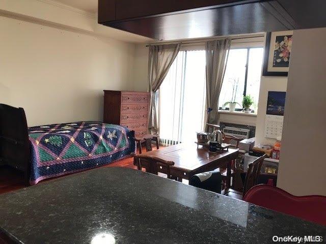 bedroom featuring a fireplace