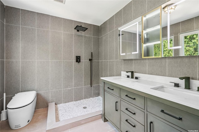 bathroom featuring walk in shower, tile patterned floors, and tile walls