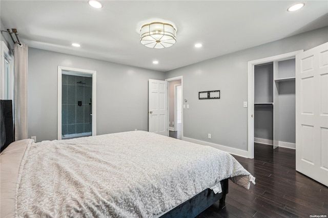 bedroom with connected bathroom, a closet, and dark wood-type flooring