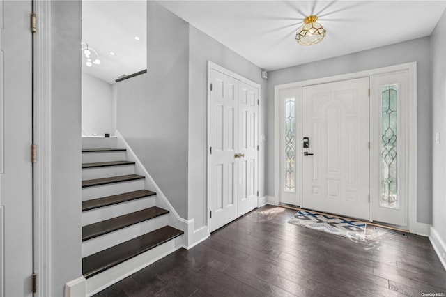 entrance foyer with dark hardwood / wood-style flooring