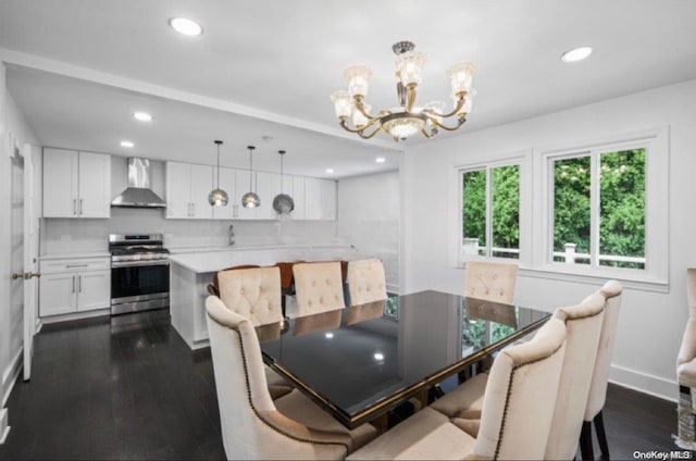 dining space with a chandelier and dark wood-type flooring