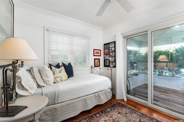 bedroom with ceiling fan, wood-type flooring, crown molding, and access to outside