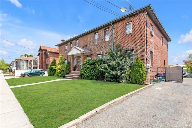 view of front of home featuring a front lawn