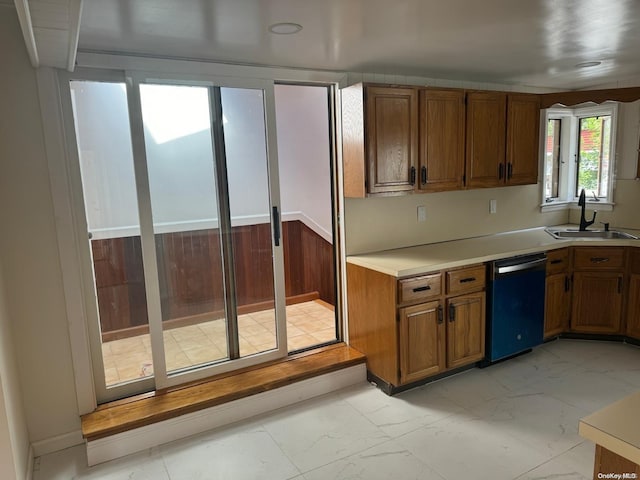 kitchen featuring black dishwasher and sink