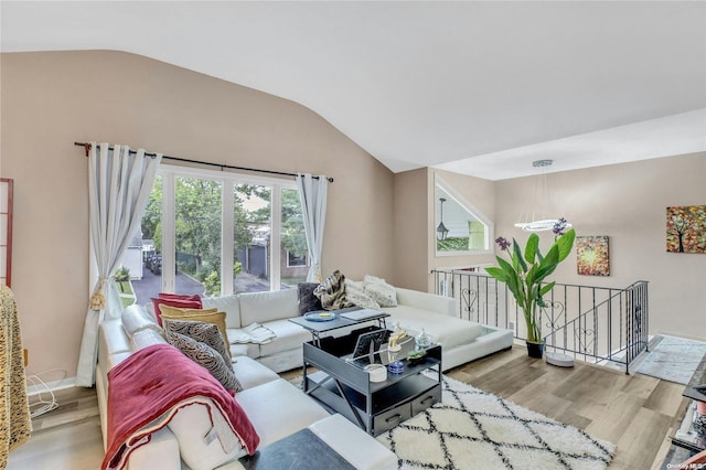 1 Smith St, Glen Head, NY 11545 - living room with lofted ceiling and wood finished floors