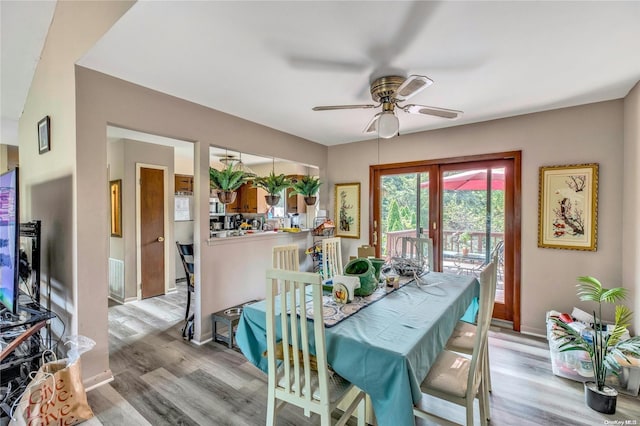 1 Smith St, Glen Head, NY 11545 - dining area featuring ceiling fan and wood finished floors