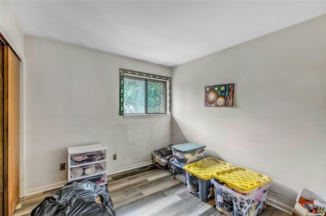 1 Smith St, Glen Head, NY 11545 - bedroom featuring wood finished floors and a closet