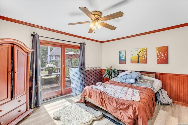 1 Smith St, Glen Head, NY 11545 - bedroom with access to exterior, light wood finished floors, ornamental molding, wainscoting, and ceiling fan