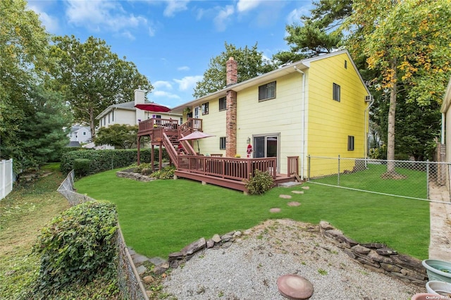 1 Smith St, Glen Head, NY 11545 - back of house featuring a wooden deck, a fenced backyard, a chimney, and stairway