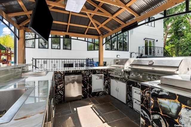 view of patio / terrace featuring a gazebo and area for grilling