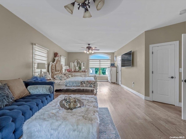 bedroom featuring ceiling fan and light wood-type flooring