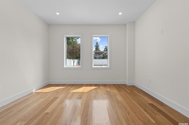 empty room featuring light hardwood / wood-style floors