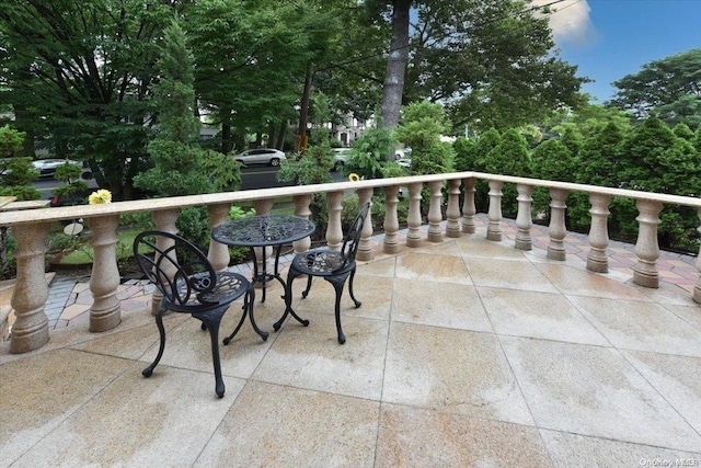 view of patio / terrace with a balcony