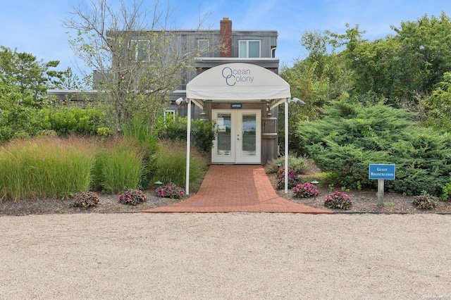 entrance to property featuring french doors