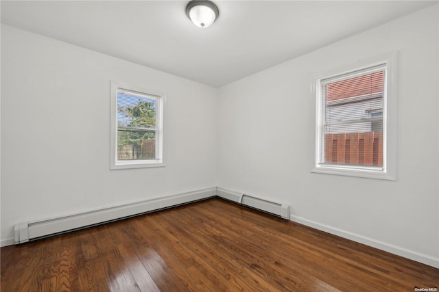 unfurnished room with dark wood-type flooring