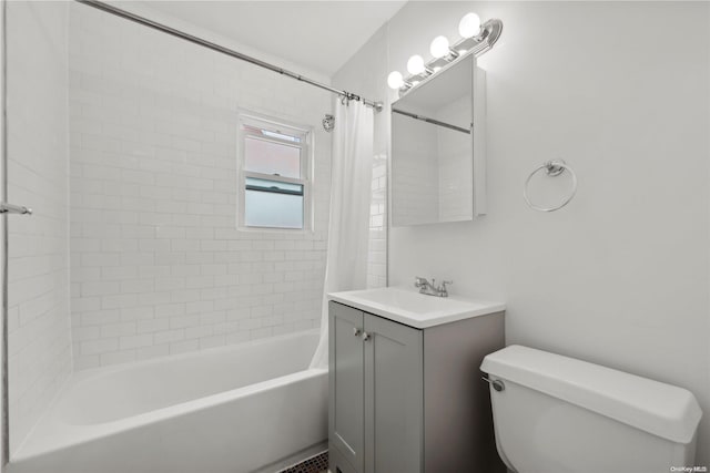 full bathroom featuring vanity, shower / tub combo, and toilet