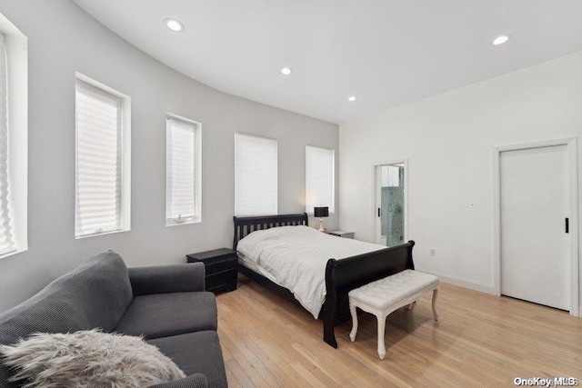 bedroom with light wood-type flooring