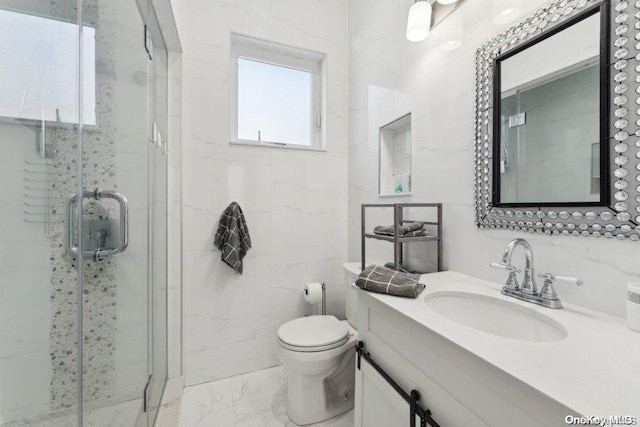 bathroom featuring toilet, an enclosed shower, tile walls, and vanity