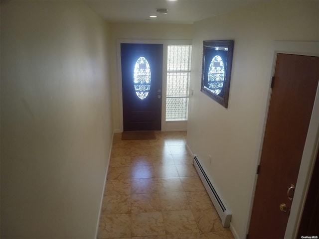 doorway to outside featuring a baseboard radiator