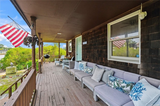 deck featuring an outdoor living space