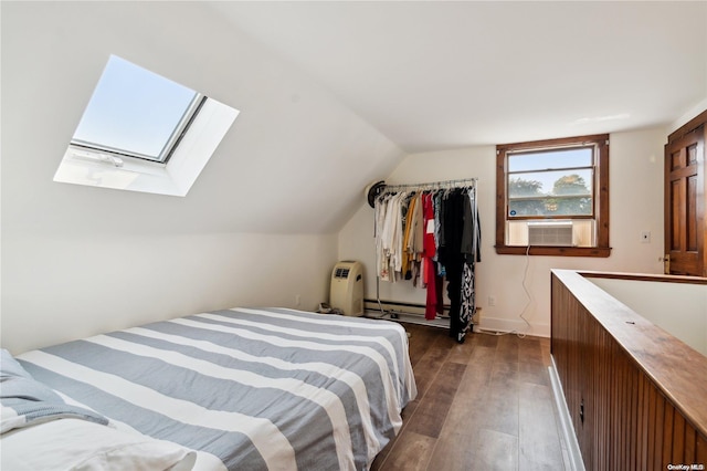 bedroom featuring vaulted ceiling with skylight, dark hardwood / wood-style floors, cooling unit, and a baseboard radiator