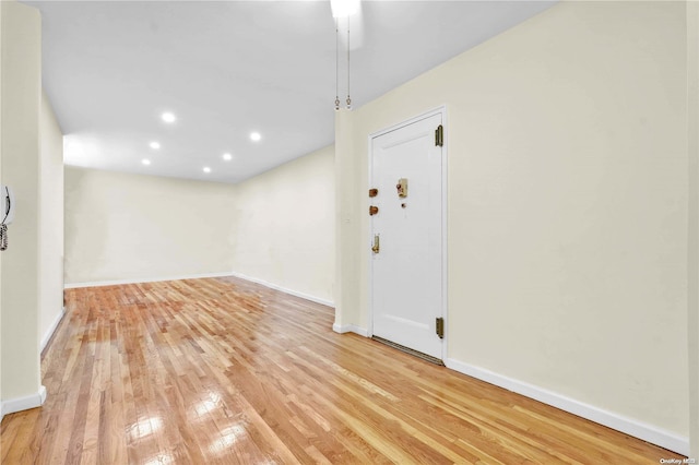 spare room with light wood-type flooring