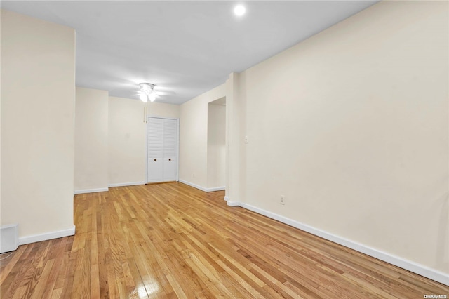 spare room with light hardwood / wood-style flooring