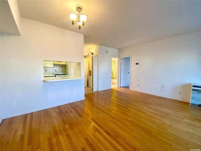 unfurnished living room with light wood-type flooring