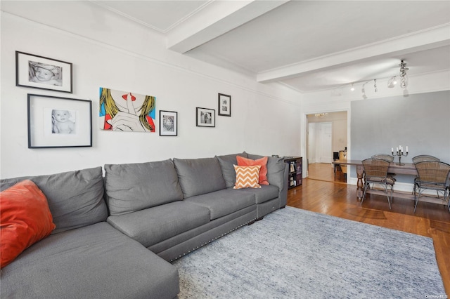 living room with beam ceiling and dark wood-type flooring